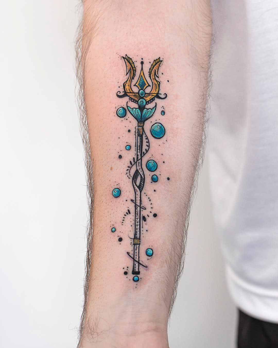 arm tattoo trident