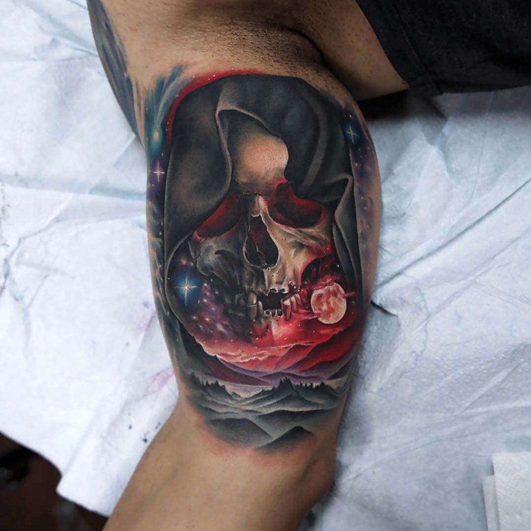 bicep tattoo skull death