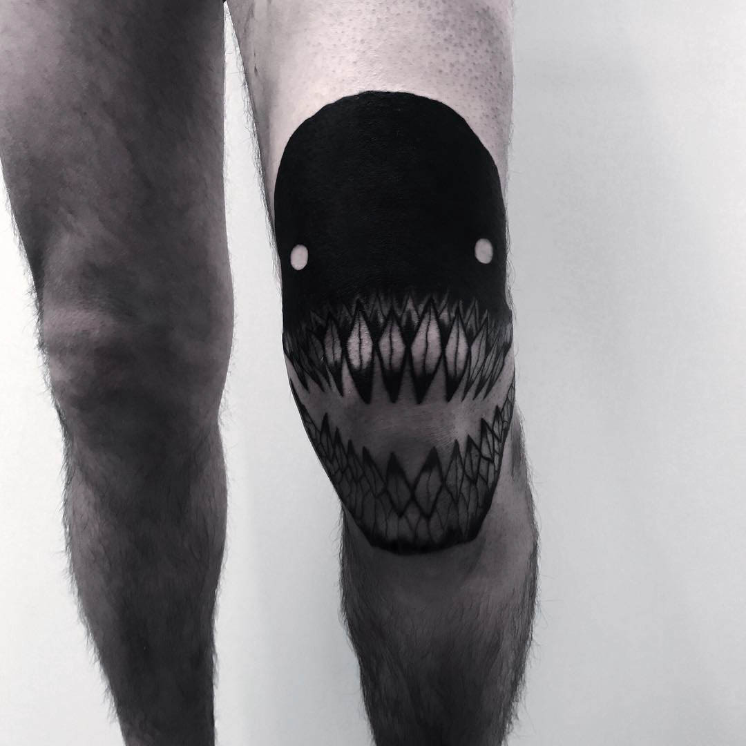 knee demon tattoo