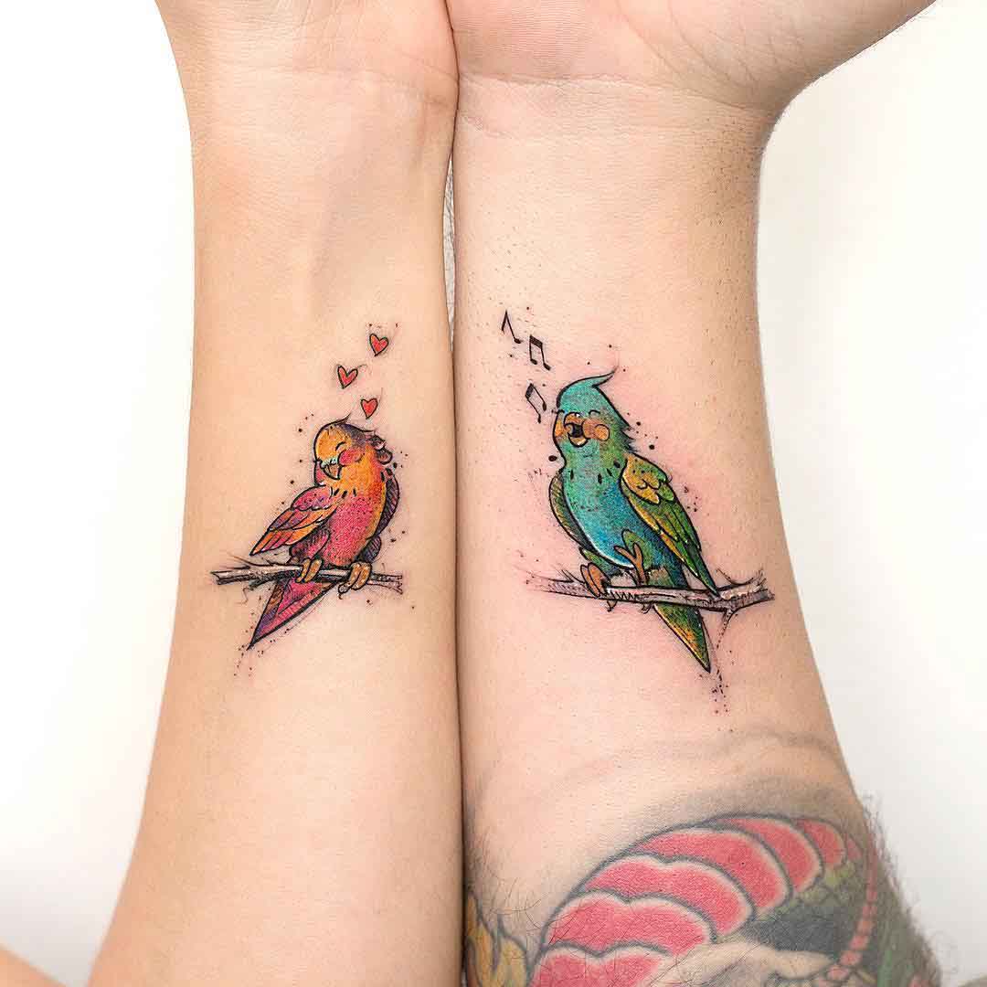 arm tattoo birs for couple