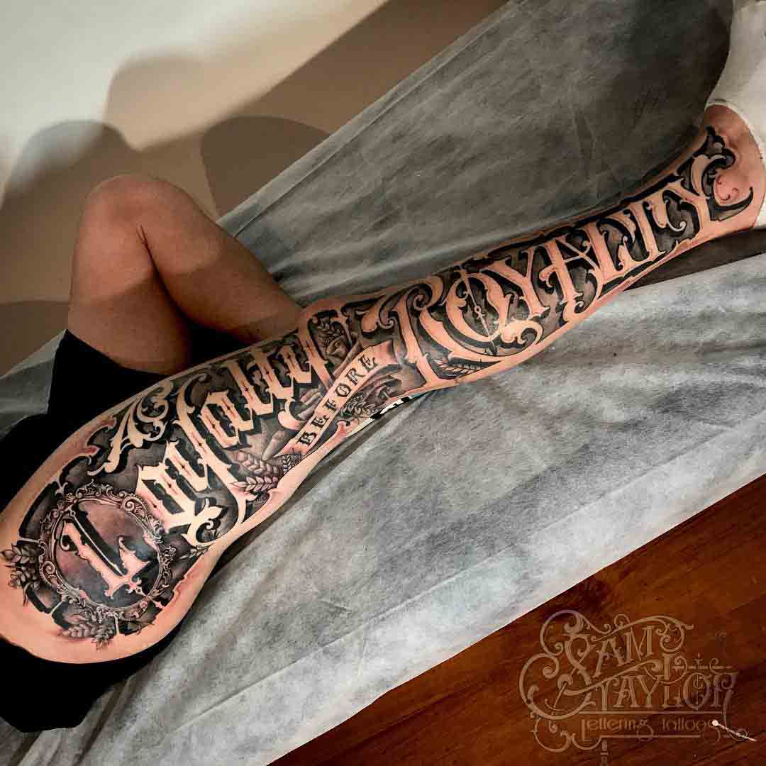 leg tattoo lettering chicano
