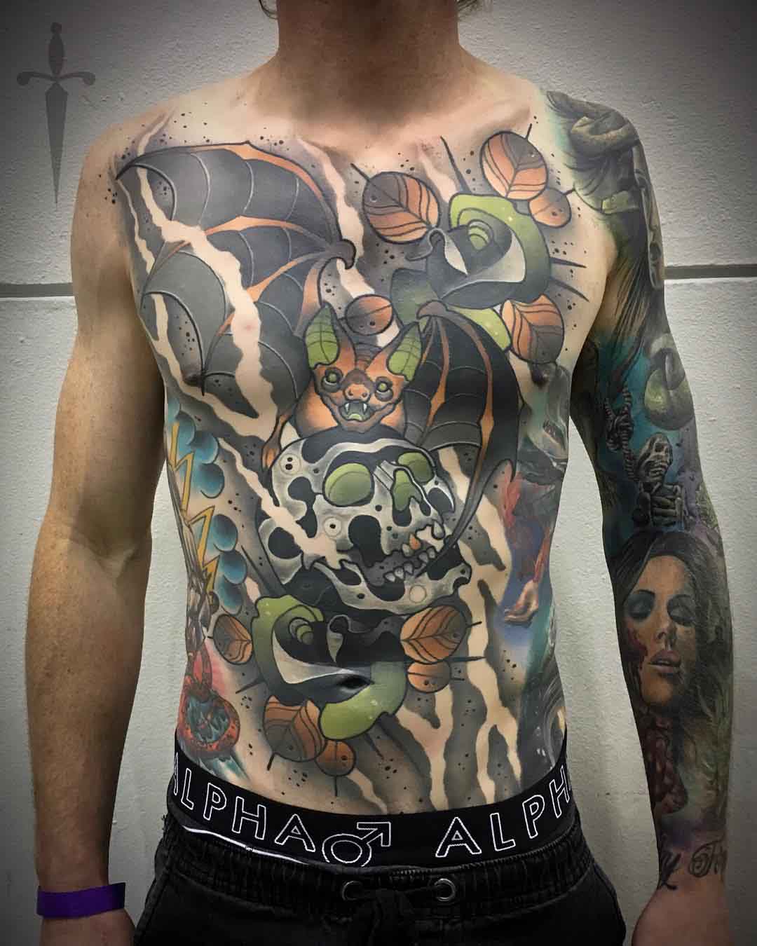 neo-traditional tattoo on full torso
