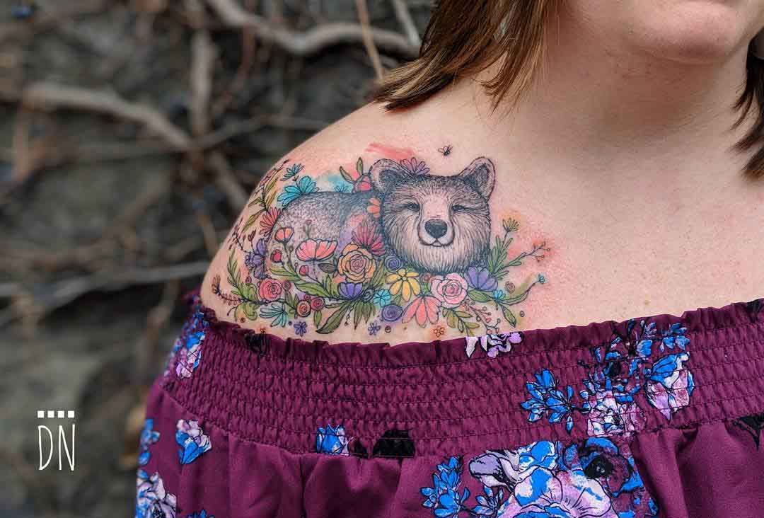 collar bone tattoo bear with flowers