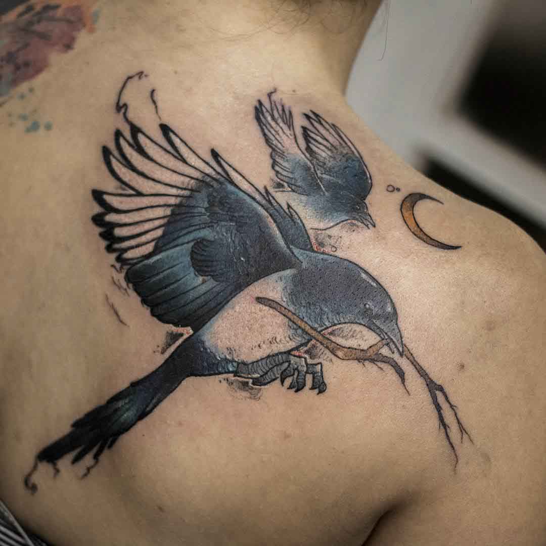 shoulder blade tattoo magpie