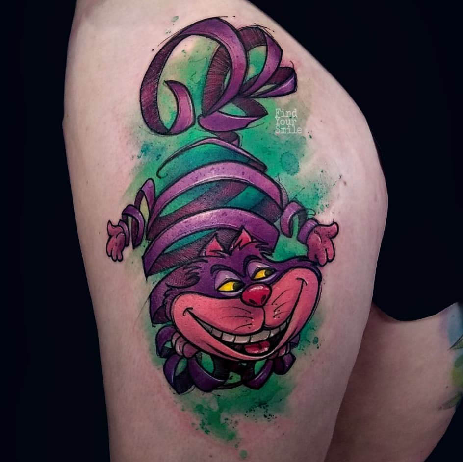 cool cheshire cat tattoo on thigh