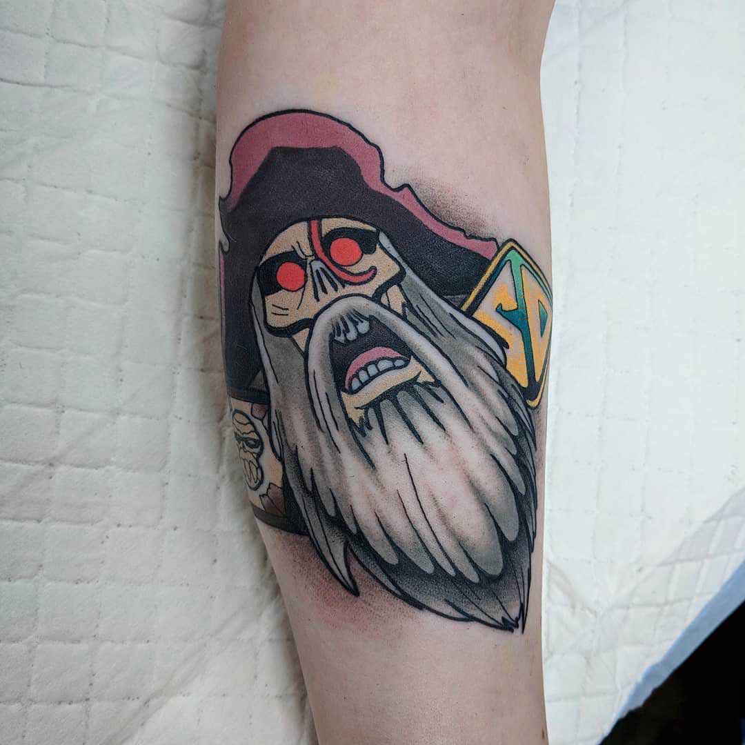 arm tattoo scooby-doo pirate