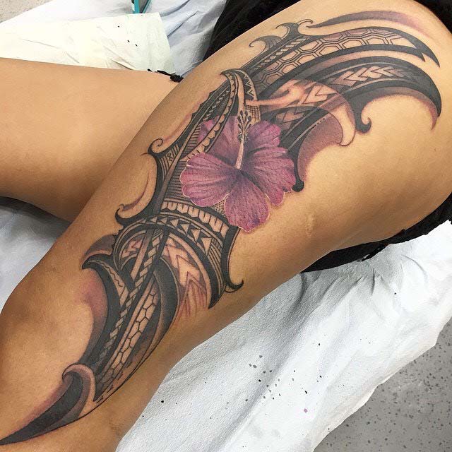thigh tattoo polynesian flower