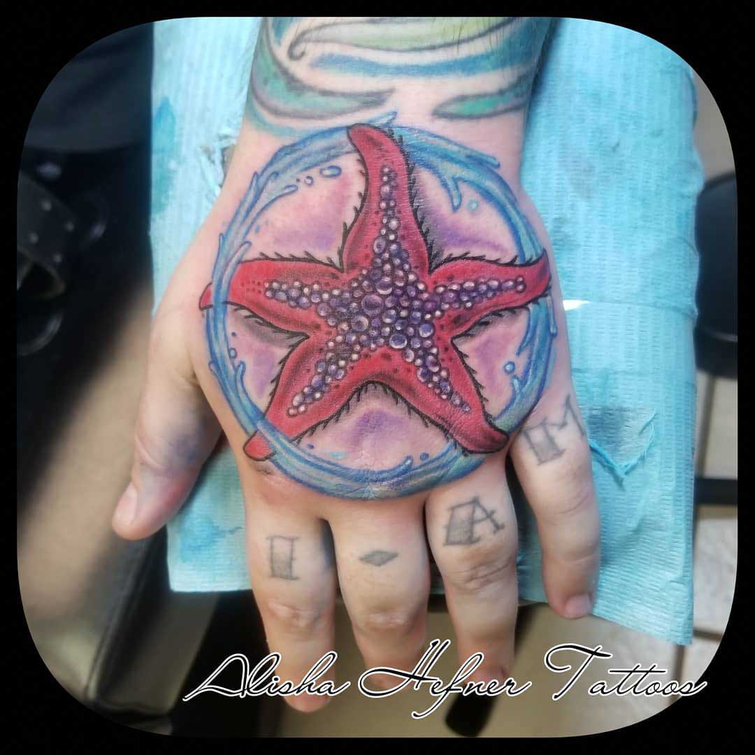 hand tattoo starfish