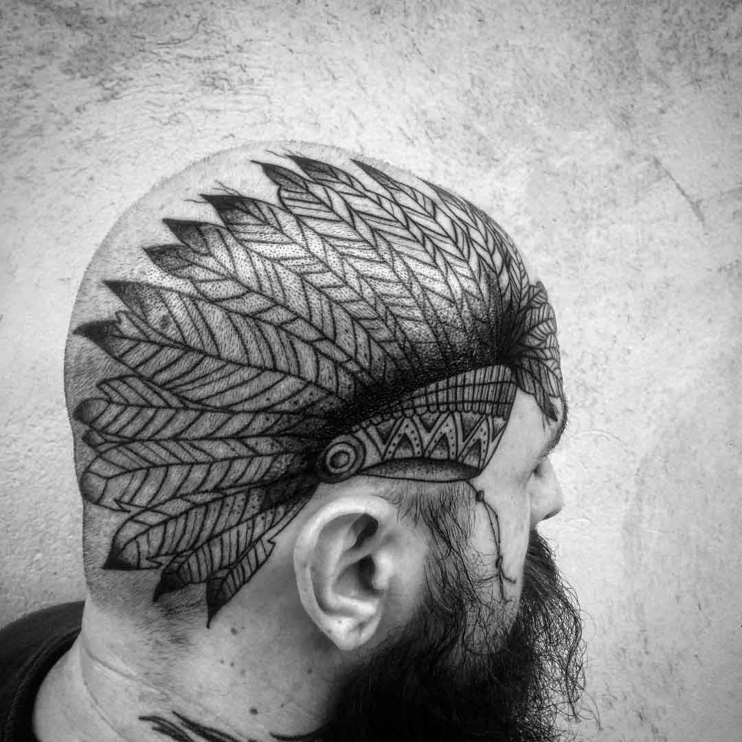 head tattoo feather