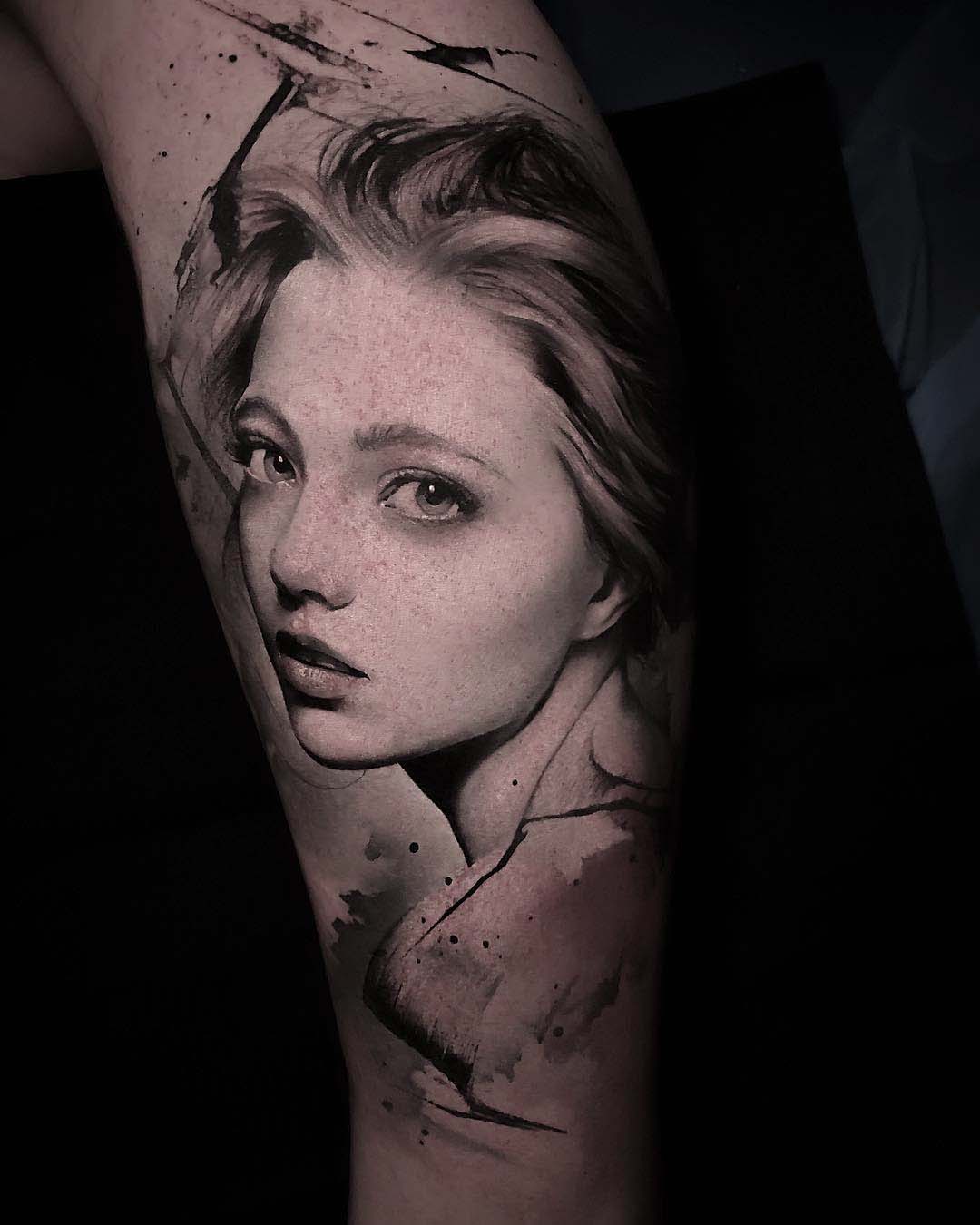 grey realistic portrait tattoo