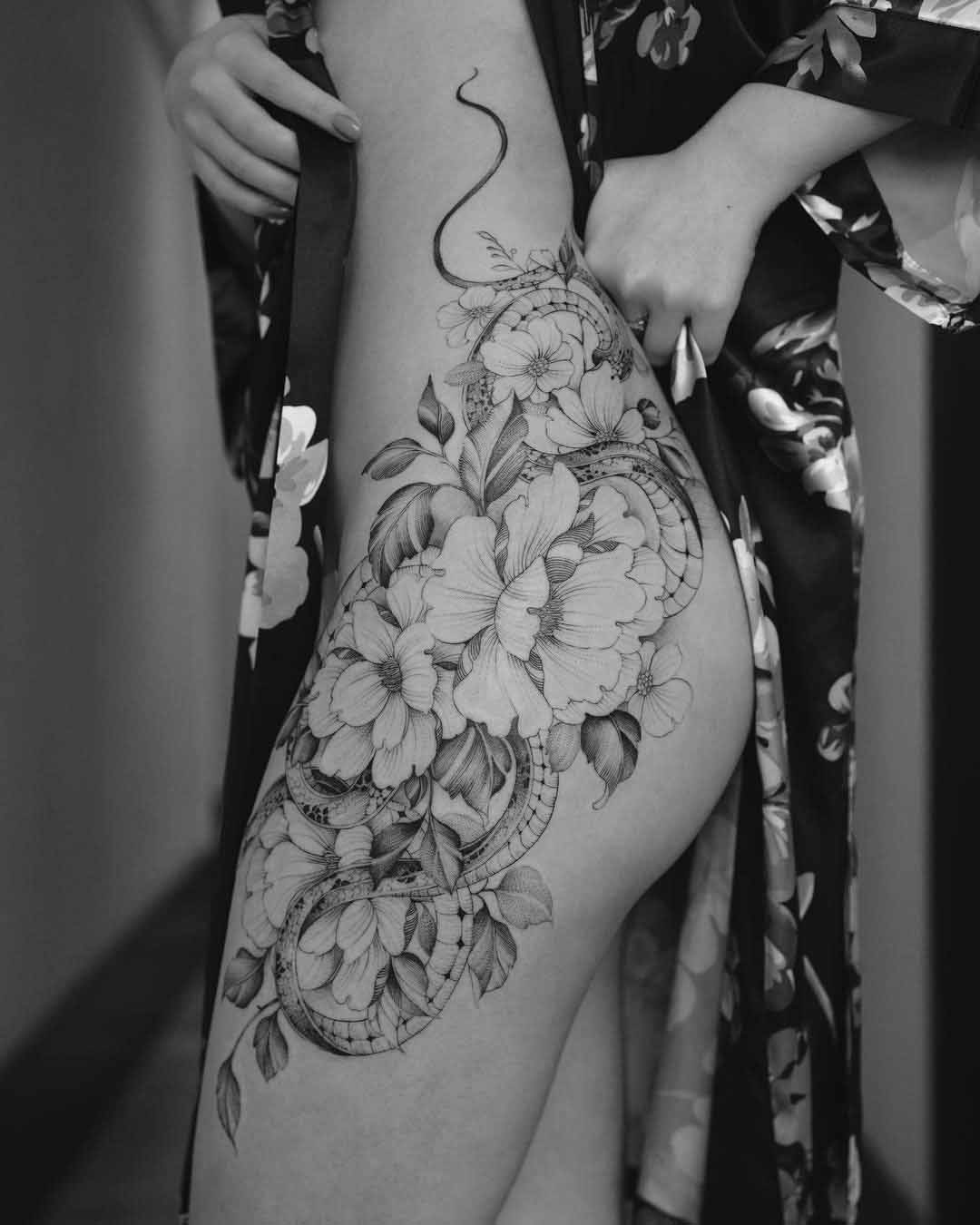 flowers tattoo on hip