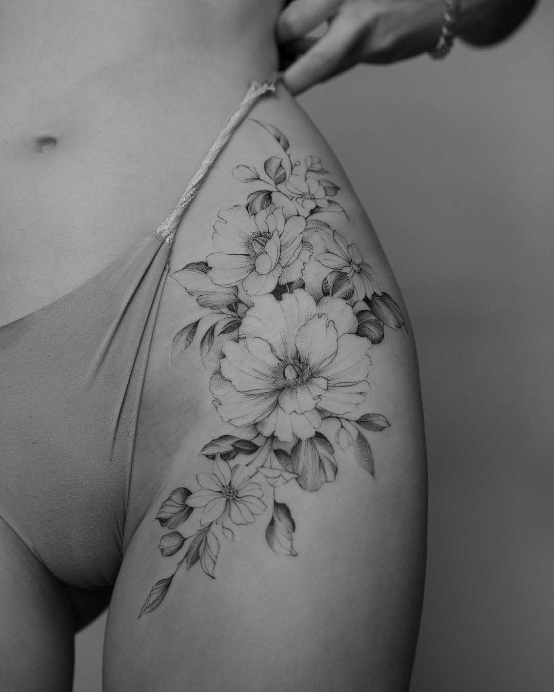 hip flowers tattoo ointimate