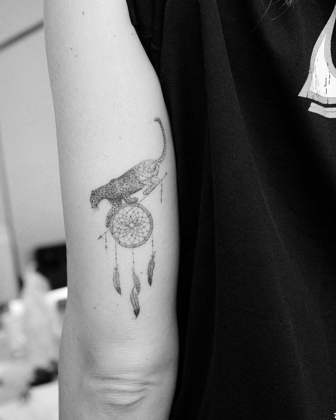 tricep tattoo dream catcher puma