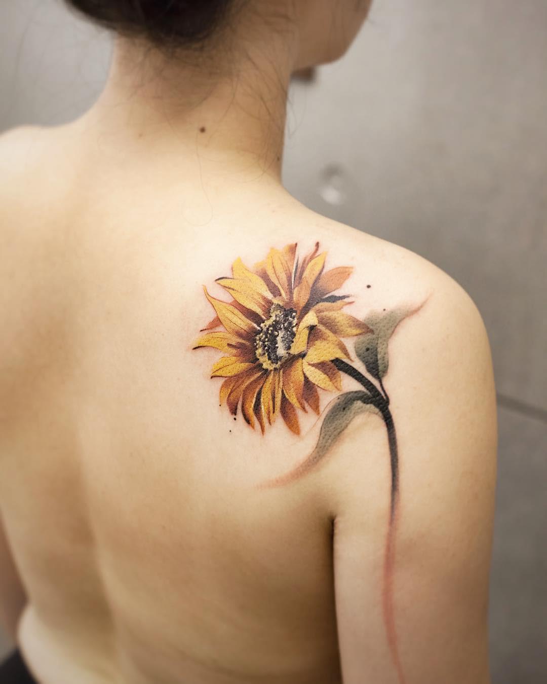 shoulder blade tattoo sunflower
