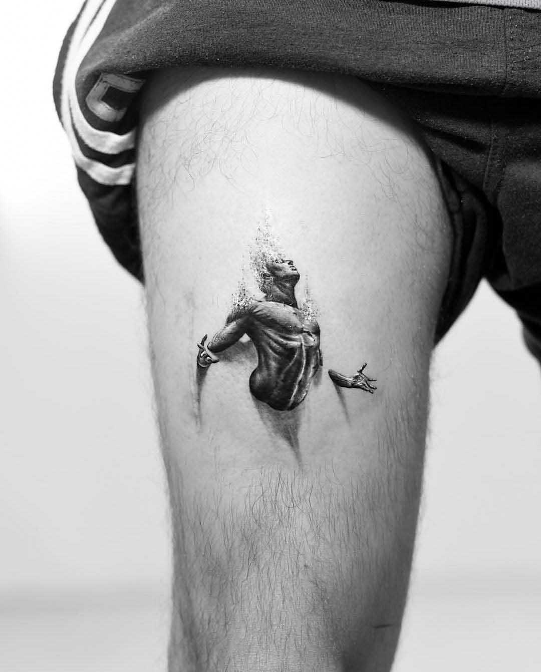 thigh tattoo man