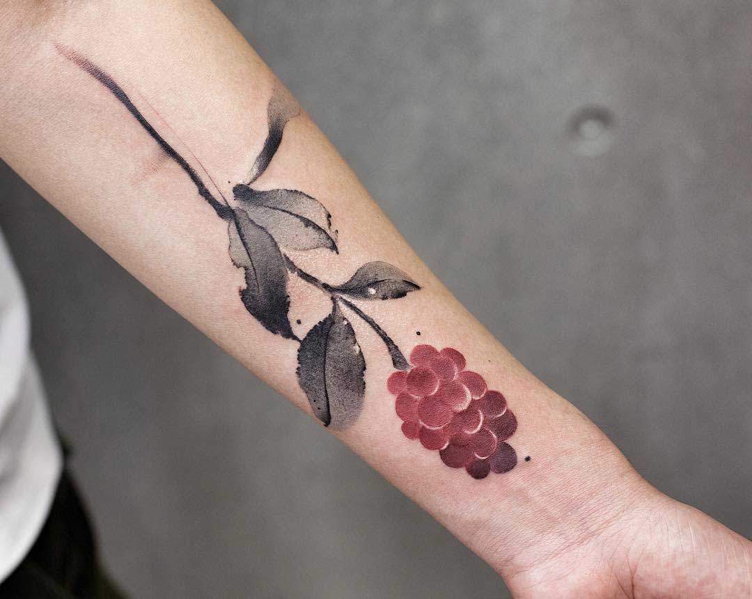 arm tattoo raspberry